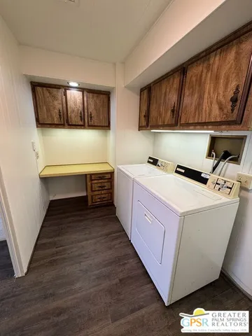 a sign that is sitting on a brick wall