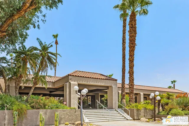 a view of a city with lawn chairs