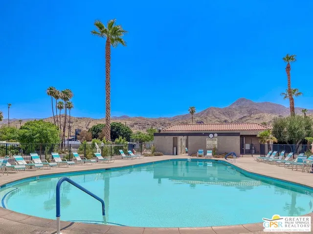 a view of a park with swings
