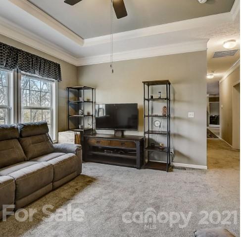 4910 Huntington Farm Road Catawba, SC 29704 - Photo 18 of 20 a living room with furniture and a flat screen tv