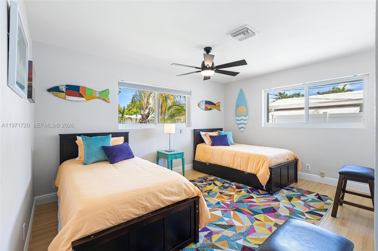 2770 Northeast 30th Street Lighthouse Point, FL 33064 - Photo 15 of 27 a bedroom with two beds and a window