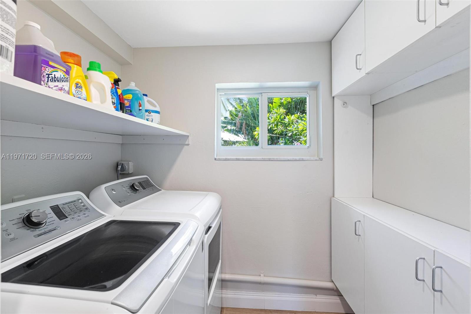 2770 Northeast 30th Street Lighthouse Point, FL 33064 - Photo 21 of 27 a utility room with dryer and washer