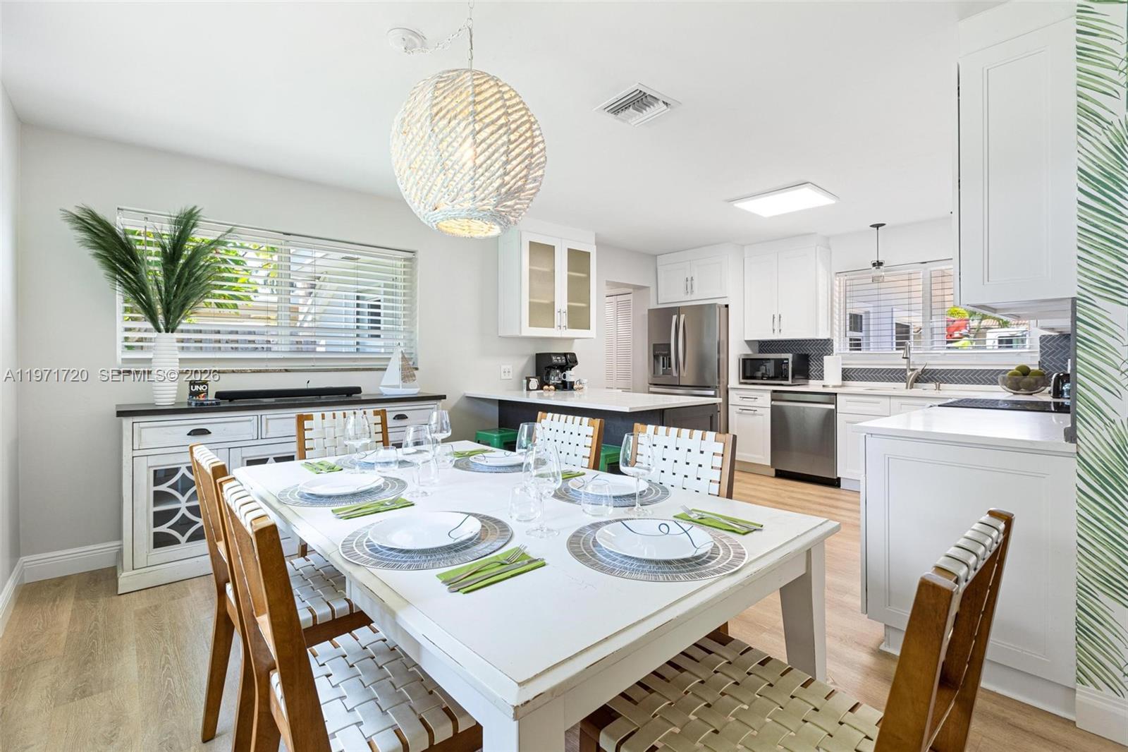 2770 Northeast 30th Street Lighthouse Point, FL 33064 - Photo 9 of 27 a view of a dining room with furniture