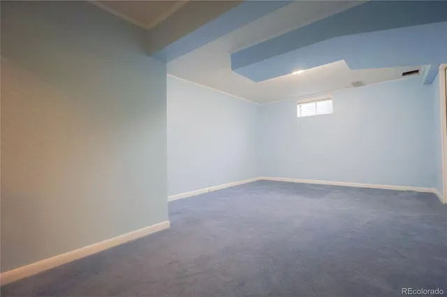 an empty room with a empty space and window