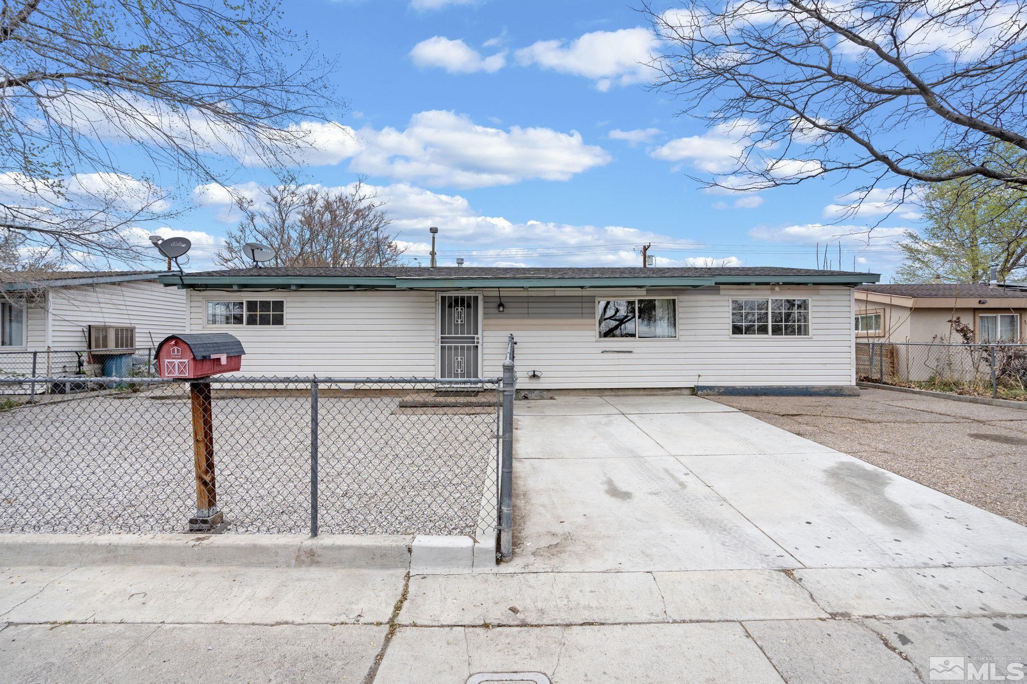 320 M Street Sparks, NV 89431 - Photo 1 of 32 front view of a house with a garage