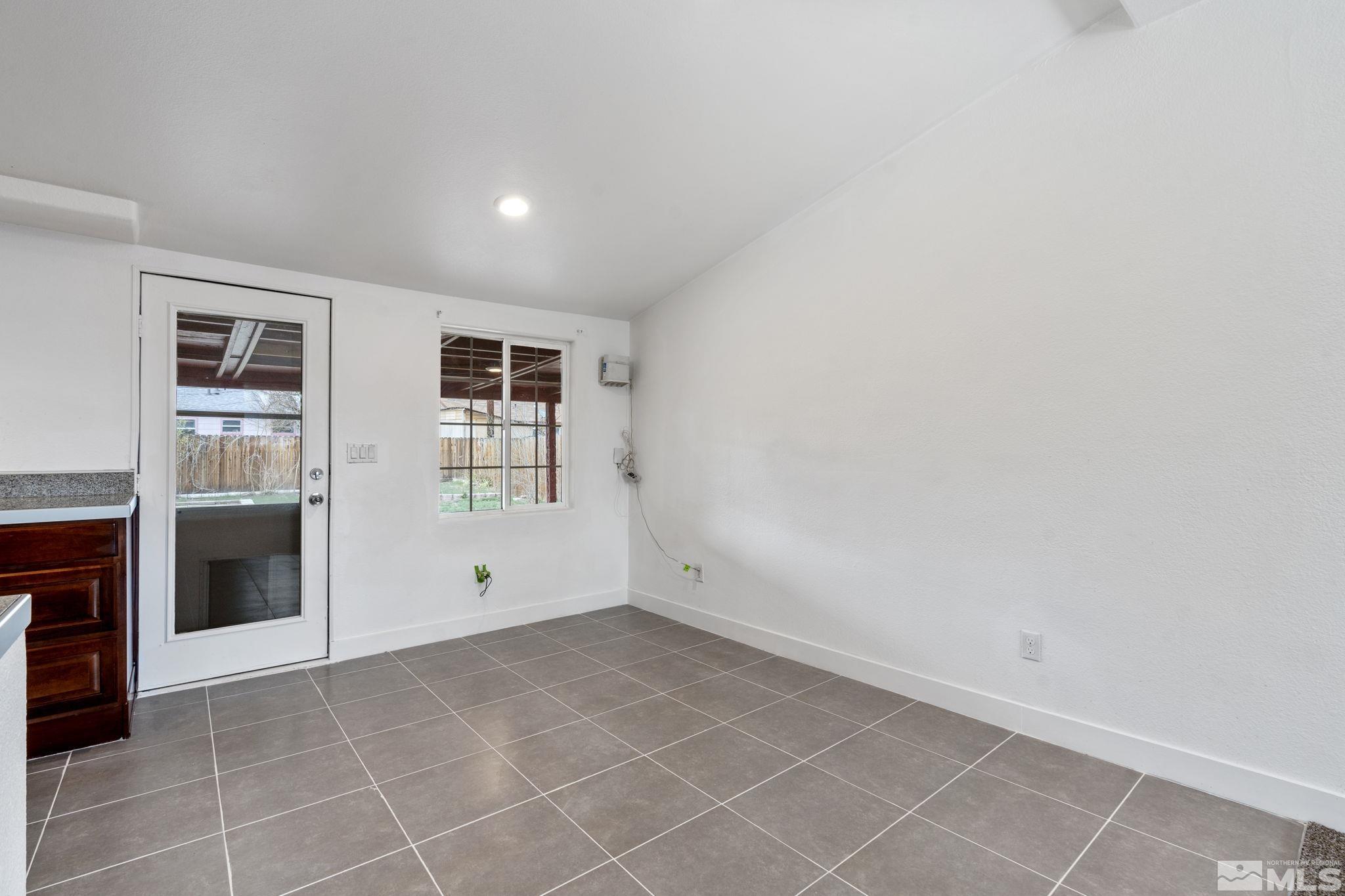 320 M Street Sparks, NV 89431 - Photo 12 of 32 a view of an empty room with a fireplace