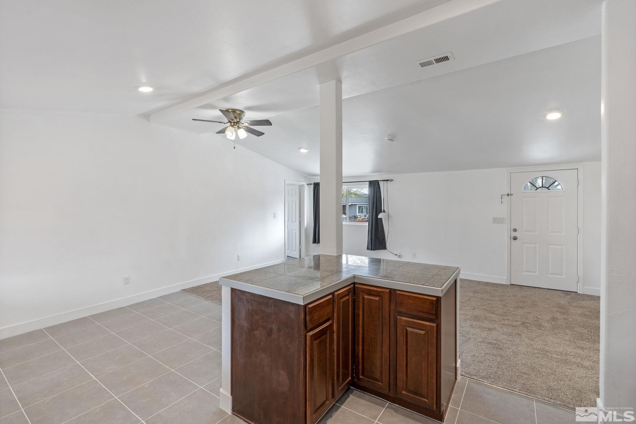 320 M Street Sparks, NV 89431 - Photo 18 of 32 a view of a kitchen counter space and cabinets