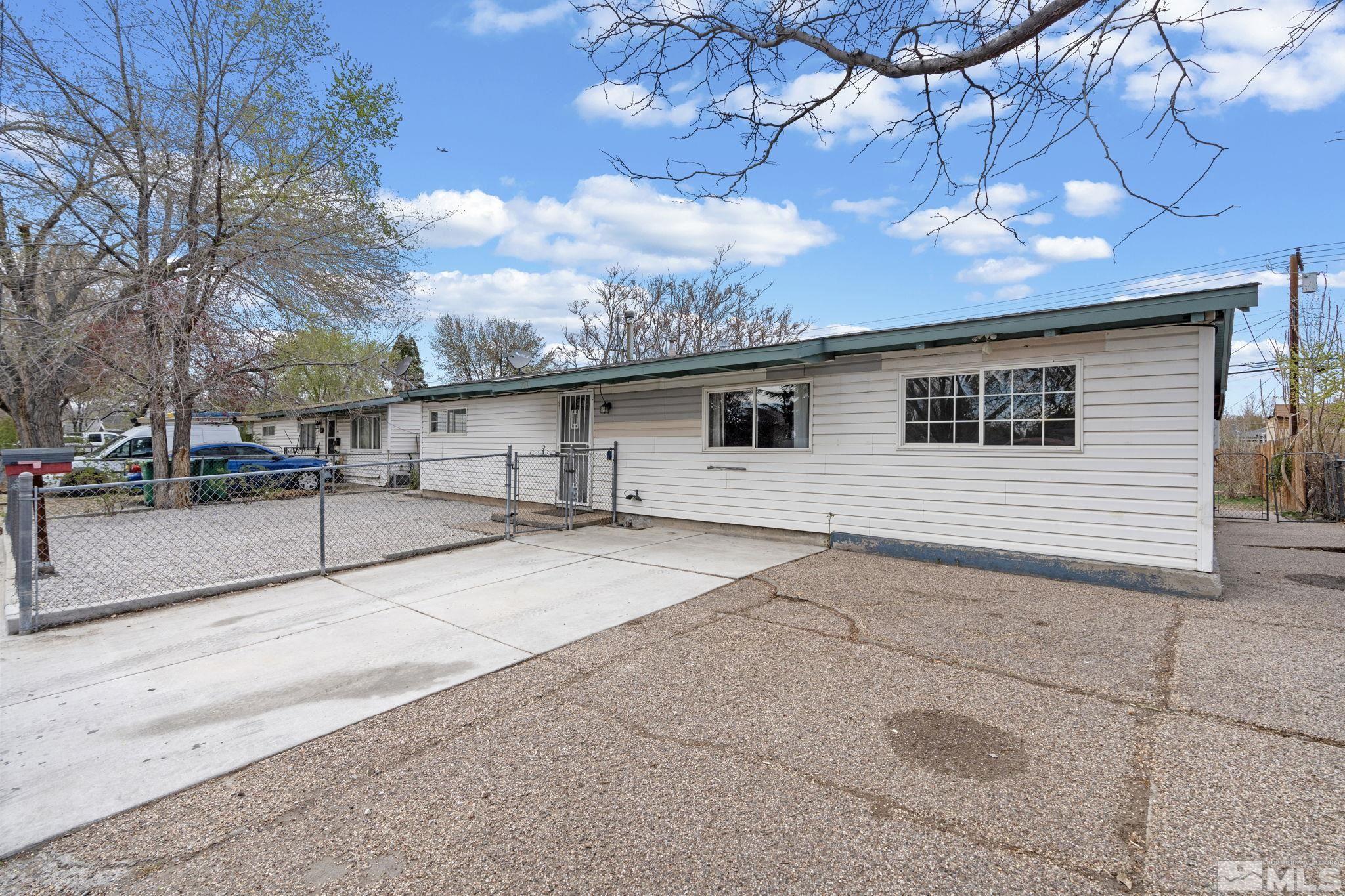 320 M Street Sparks, NV 89431 - Photo 2 of 32 a backyard of a house with table and chairs