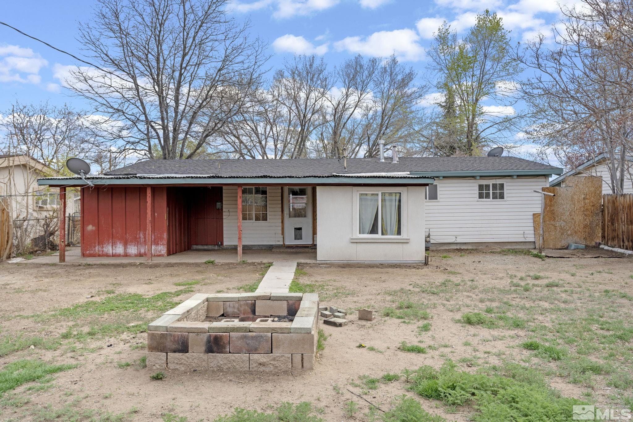 320 M Street Sparks, NV 89431 - Photo 27 of 32 a front view of a house with garden