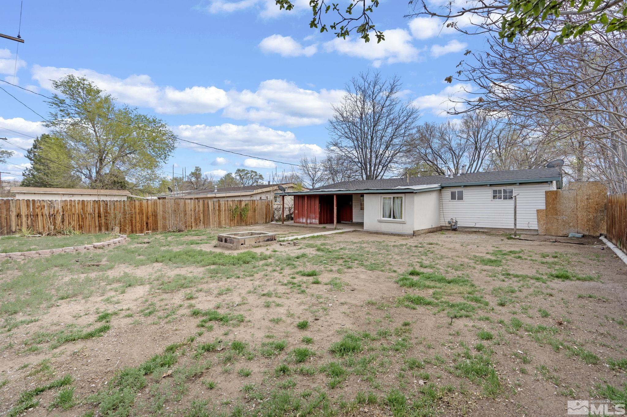 320 M Street Sparks, NV 89431 - Photo 31 of 32 a front view of a house with garden