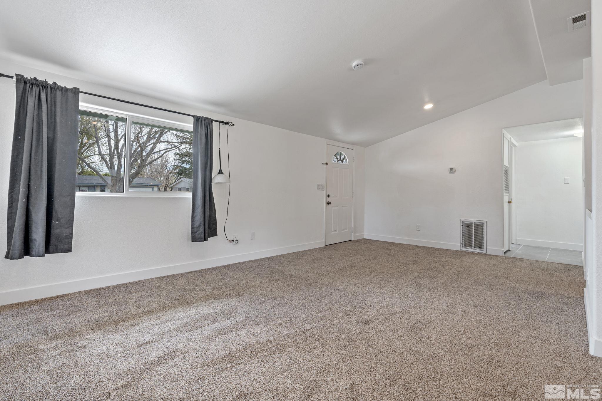 320 M Street Sparks, NV 89431 - Photo 7 of 32 a view of an empty room with a window