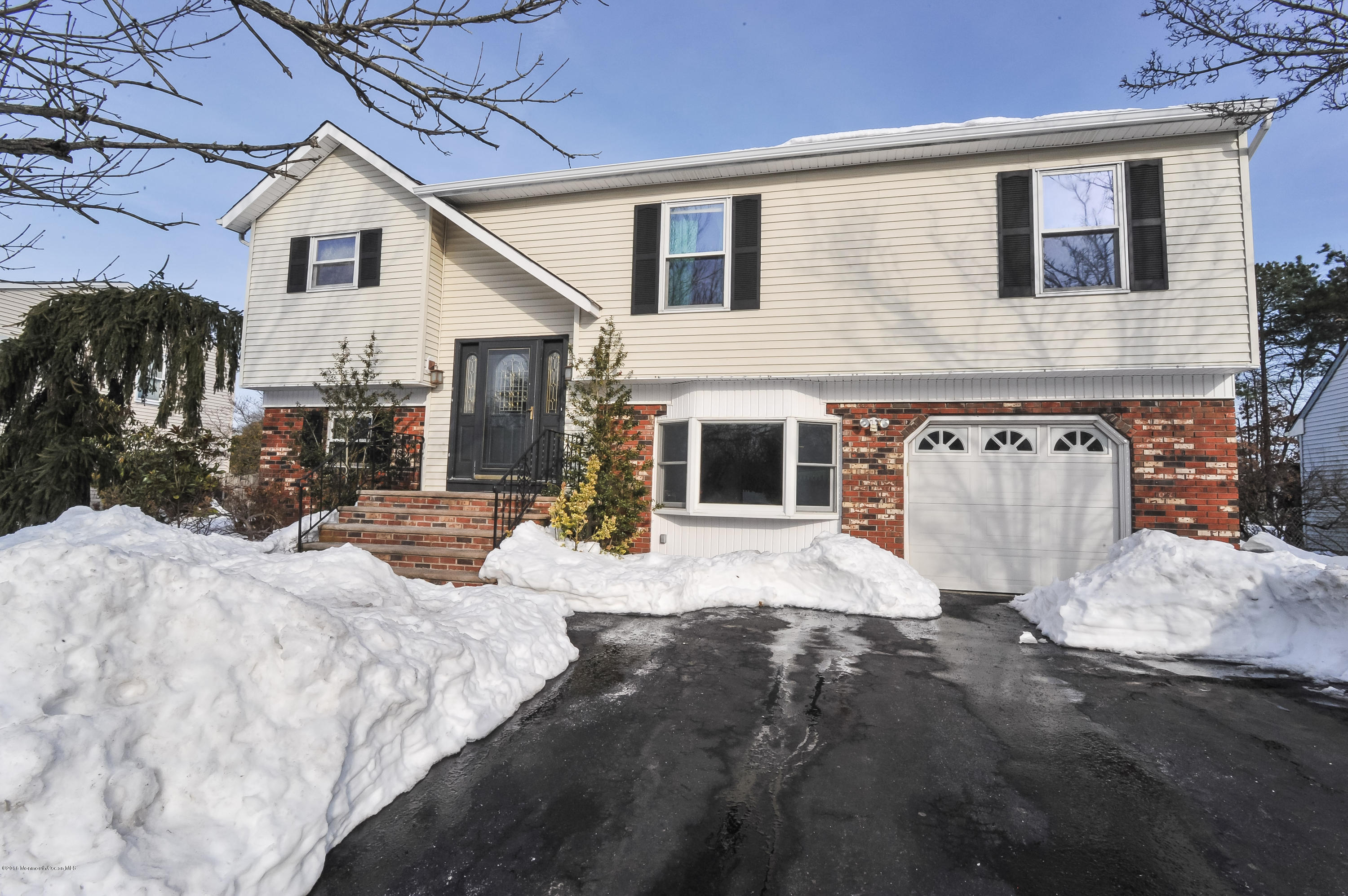 42 Hedgewood Road Howell, NJ 07731 - Photo 2 of 37 front view w/driveway