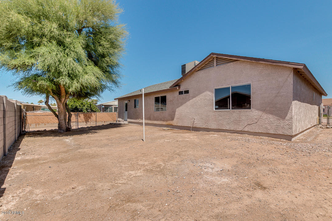 144 North Signal Butte Road Apache Junction, AZ 85120 - Photo 30 of 32 a view of backyard of house