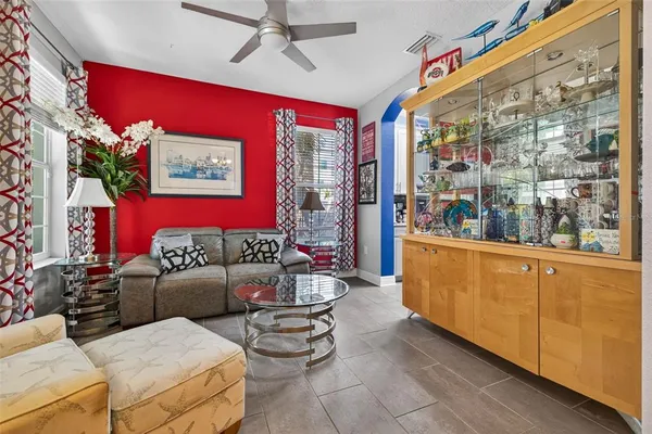 a living room with furniture and a window