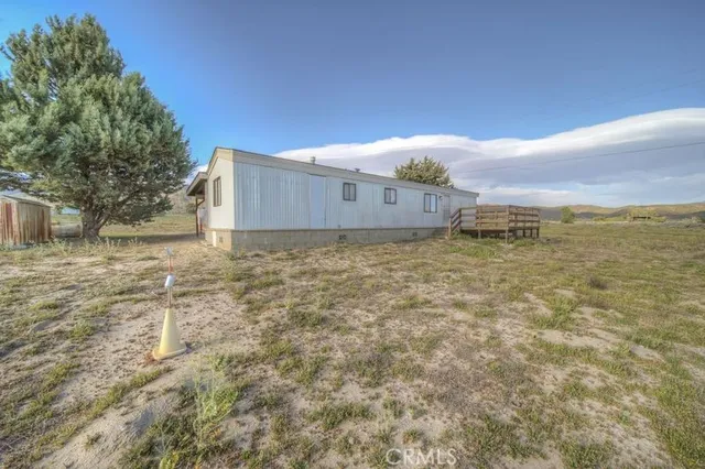 a view of a pathway with a building in the background