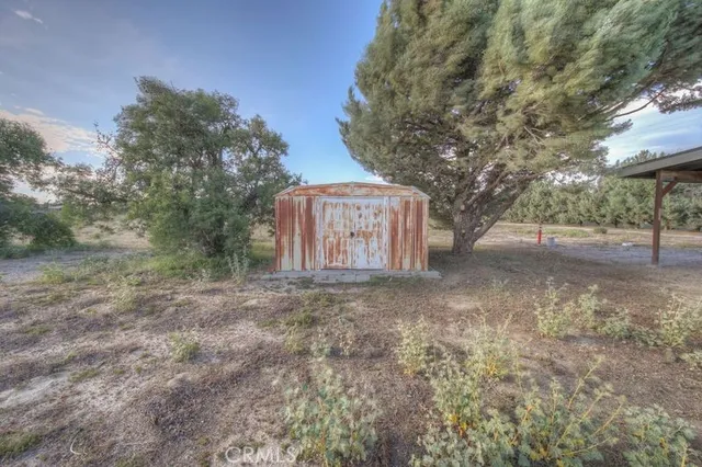 a view of a house with a trees