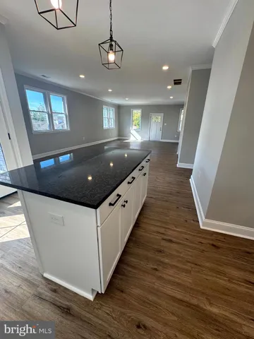 a bathroom with a toilet and a bathtub