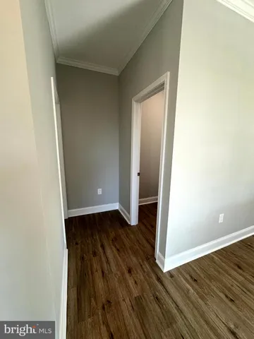 a bathroom with a sink a toilet and a shower