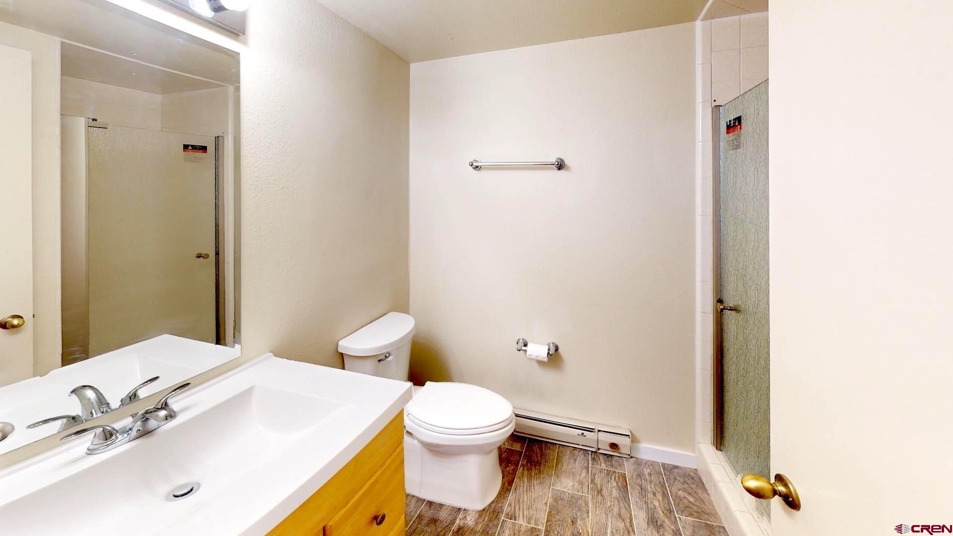 356 County Road 201 Durango, CO 81301 - Photo 14 of 35 a bathroom with a sink toilet and shower