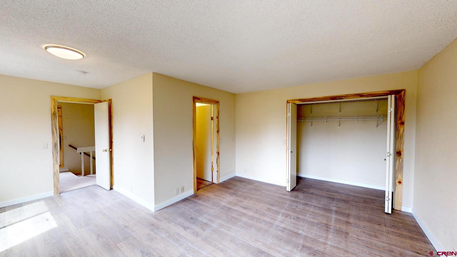 356 County Road 201 Durango, CO 81301 - Photo 15 of 35 an empty room with closet and wooden floor