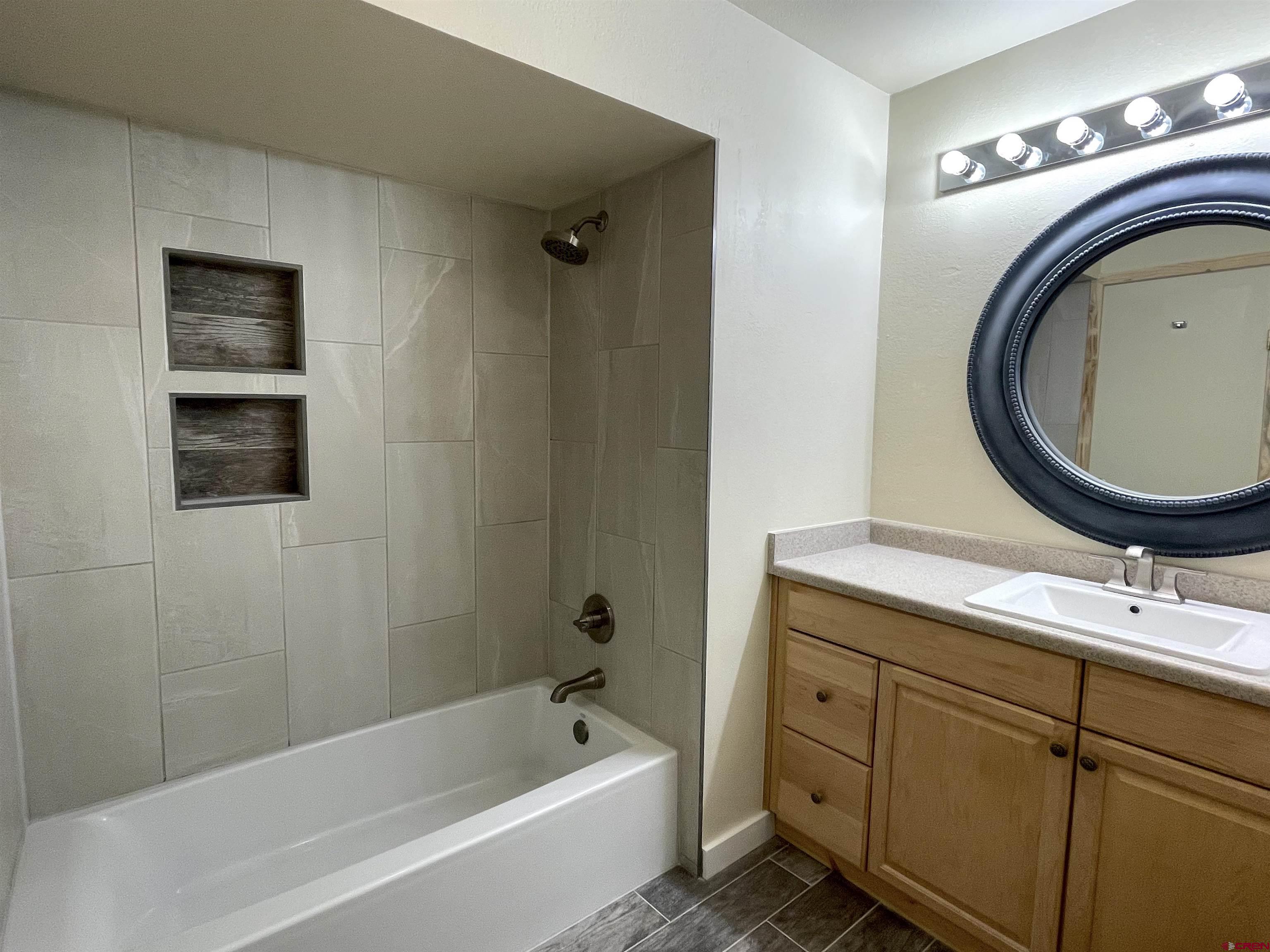 356 County Road 201 Durango, CO 81301 - Photo 18 of 35 a bathroom with a sink and a mirror
