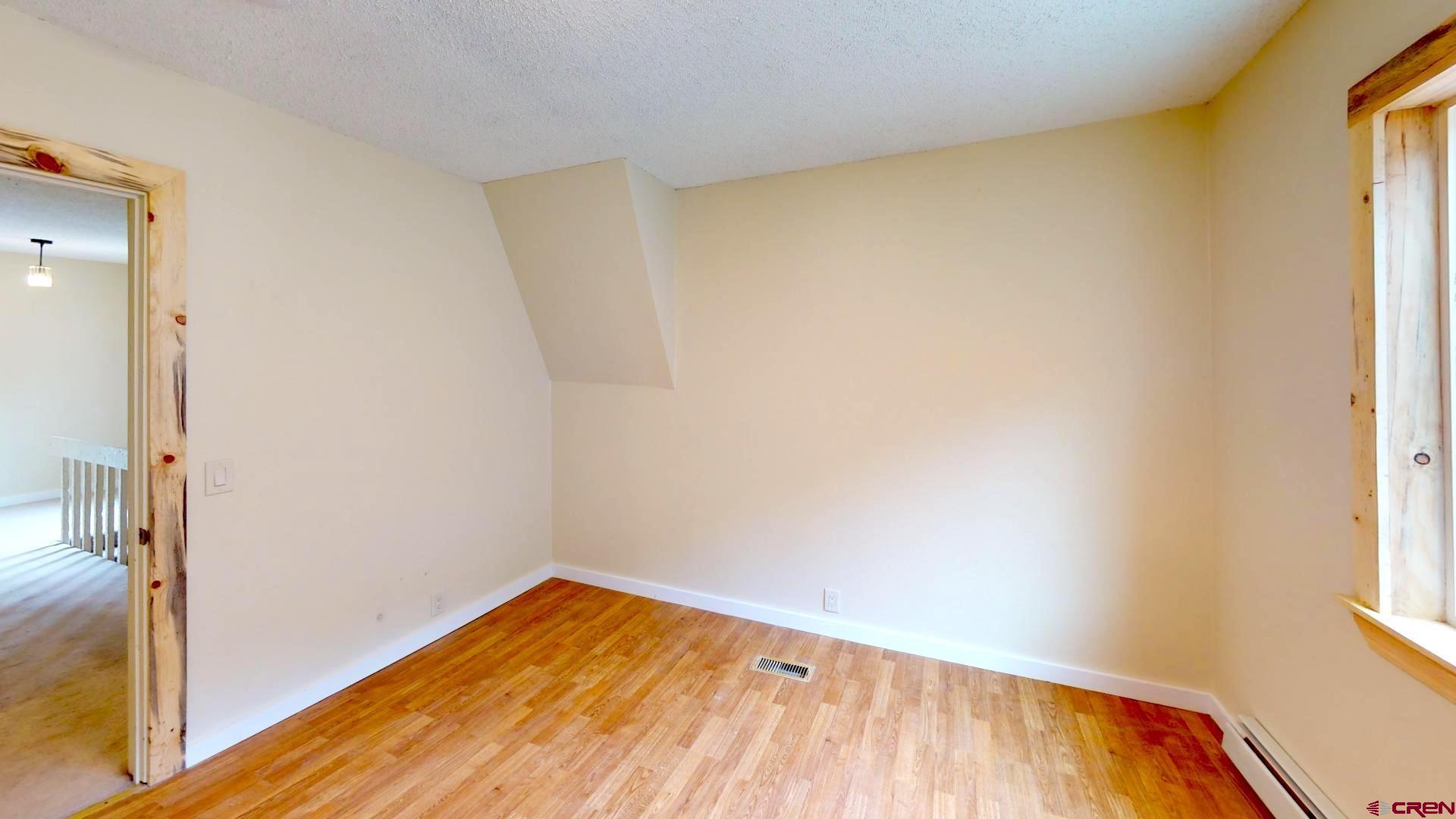 356 County Road 201 Durango, CO 81301 - Photo 19 of 35 a view of a room with wooden floor and a window
