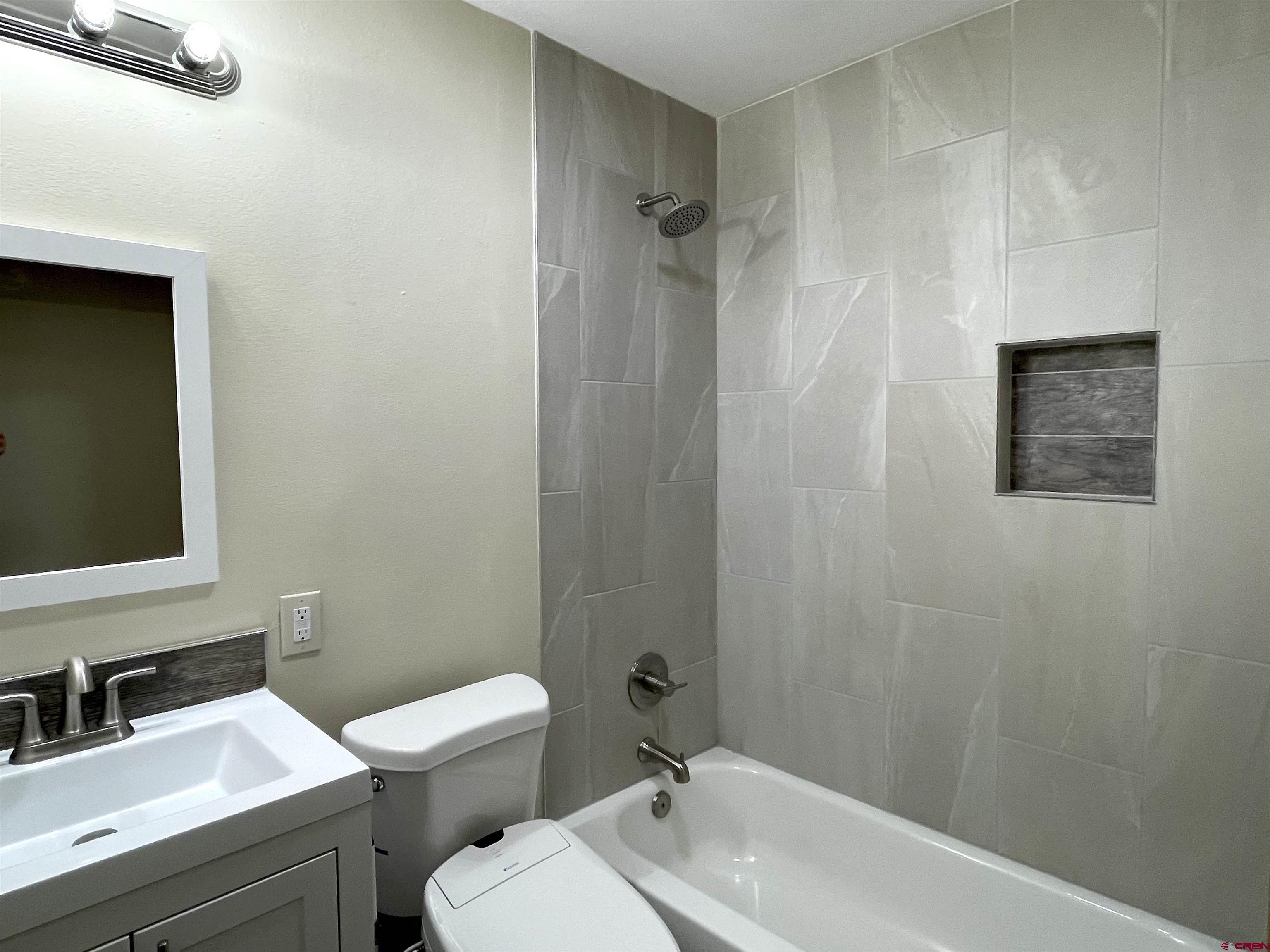 356 County Road 201 Durango, CO 81301 - Photo 21 of 35 a bathroom with a sink a toilet and shower