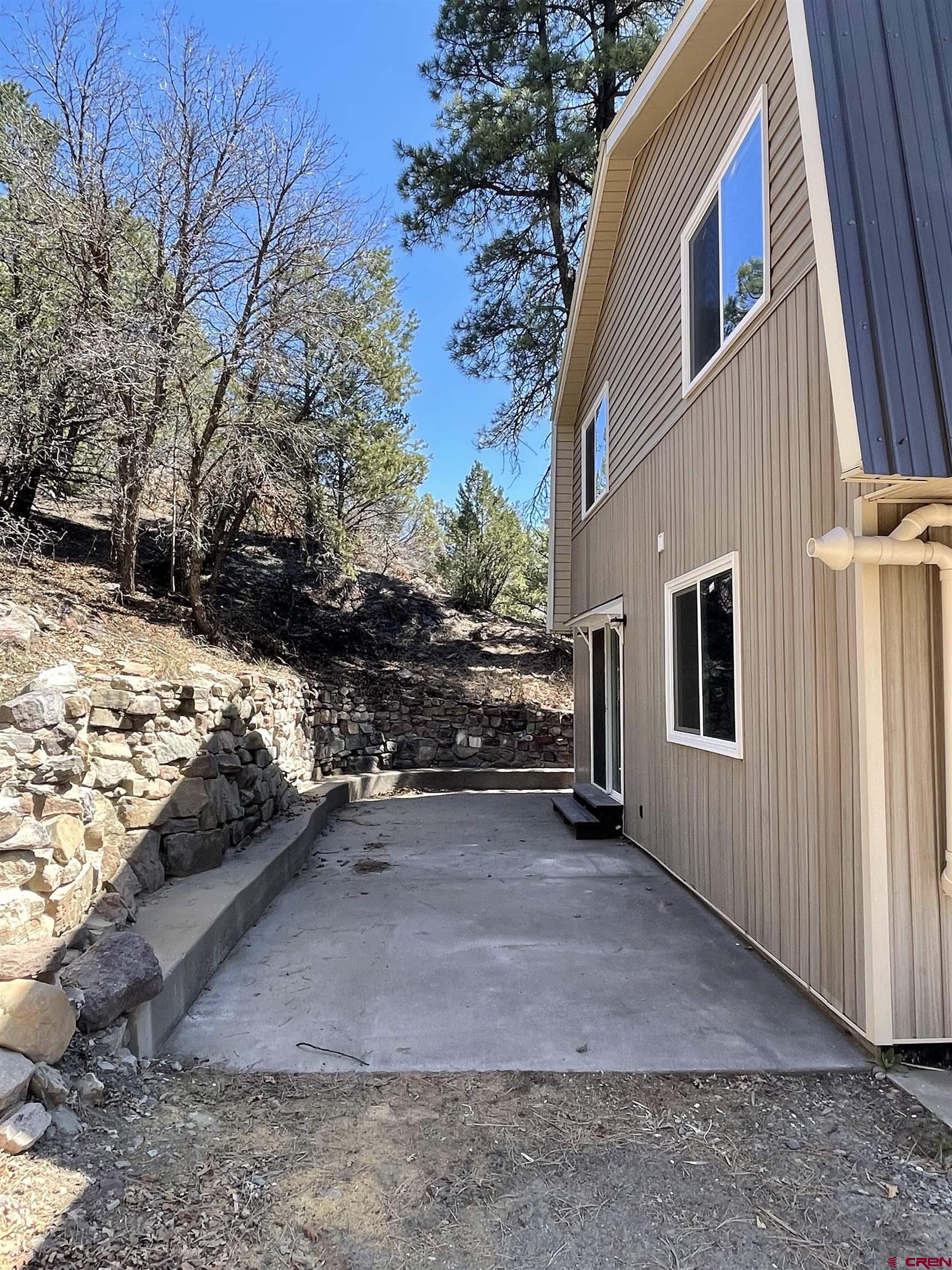 356 County Road 201 Durango, CO 81301 - Photo 26 of 35 a view of a house with a yard covered in snow