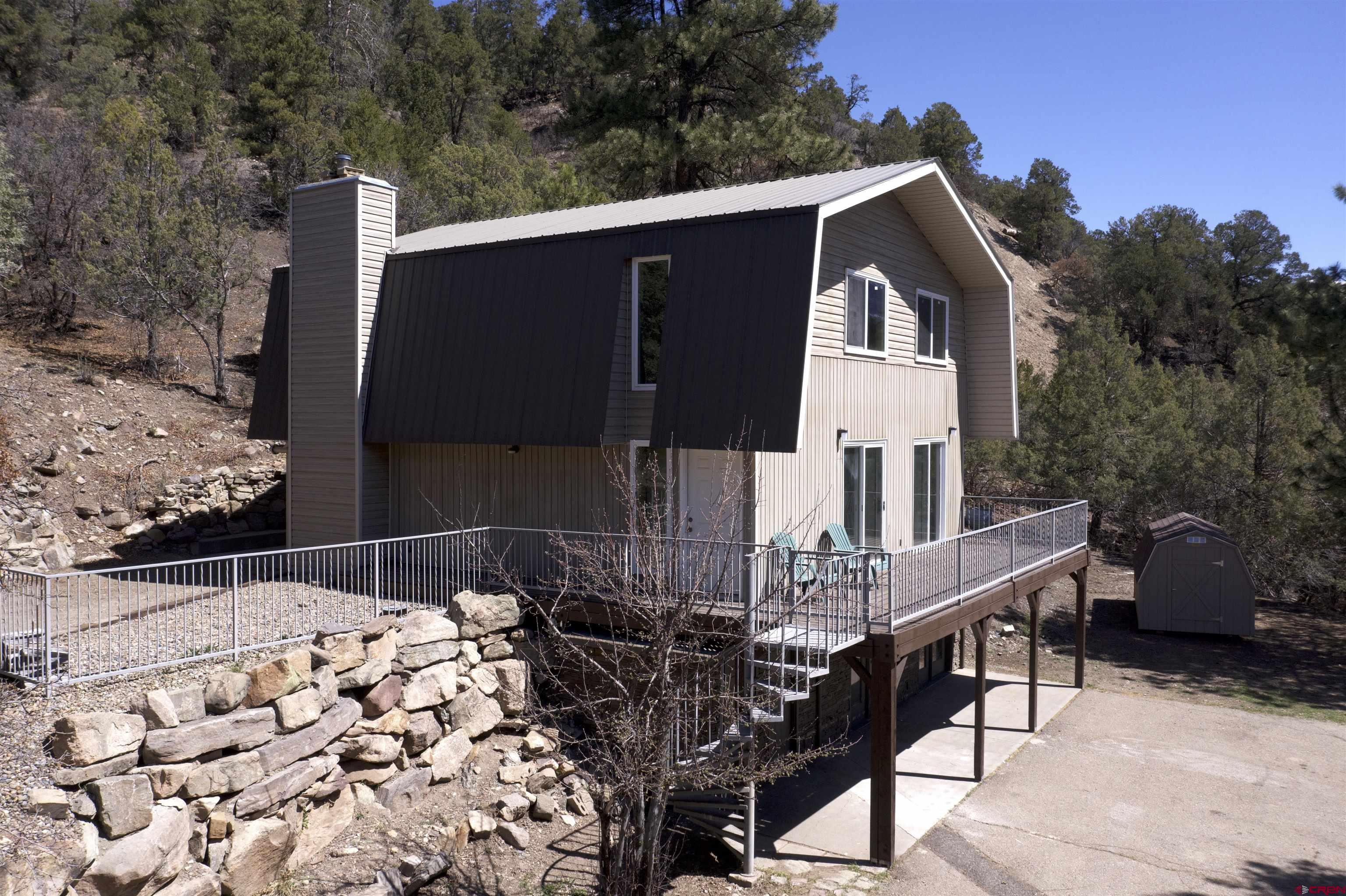 356 County Road 201 Durango, CO 81301 - Photo 28 of 35 a front view of a house with yard