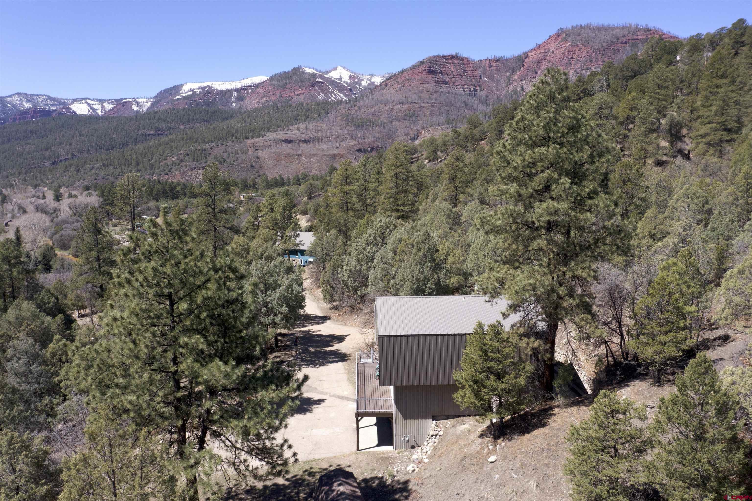 356 County Road 201 Durango, CO 81301 - Photo 30 of 35 an aerial view of a house with mountain view
