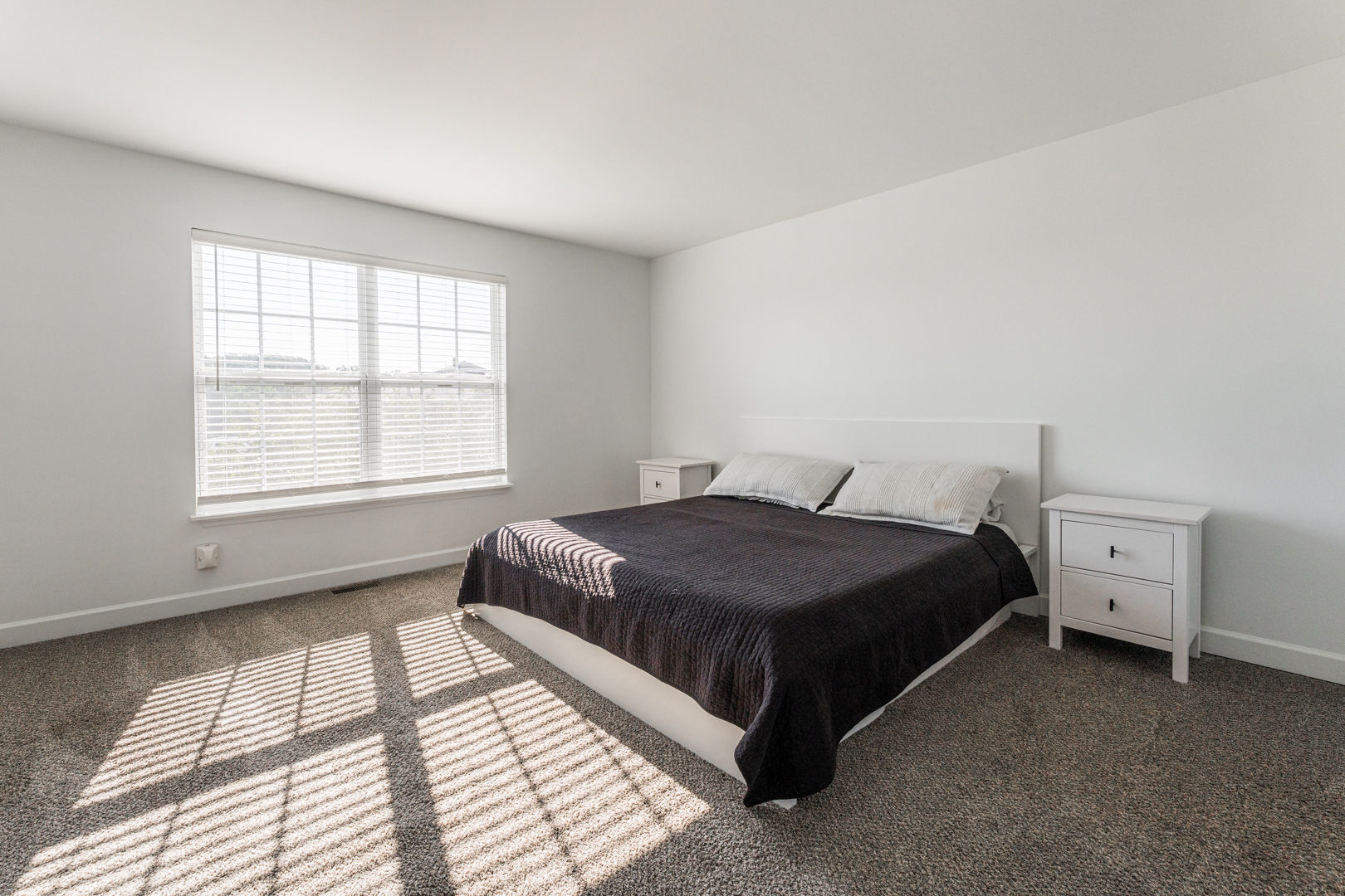 2117 Frantum Road Sycamore, IL 60178 - Photo 14 of 24 a bedroom with a bed and window