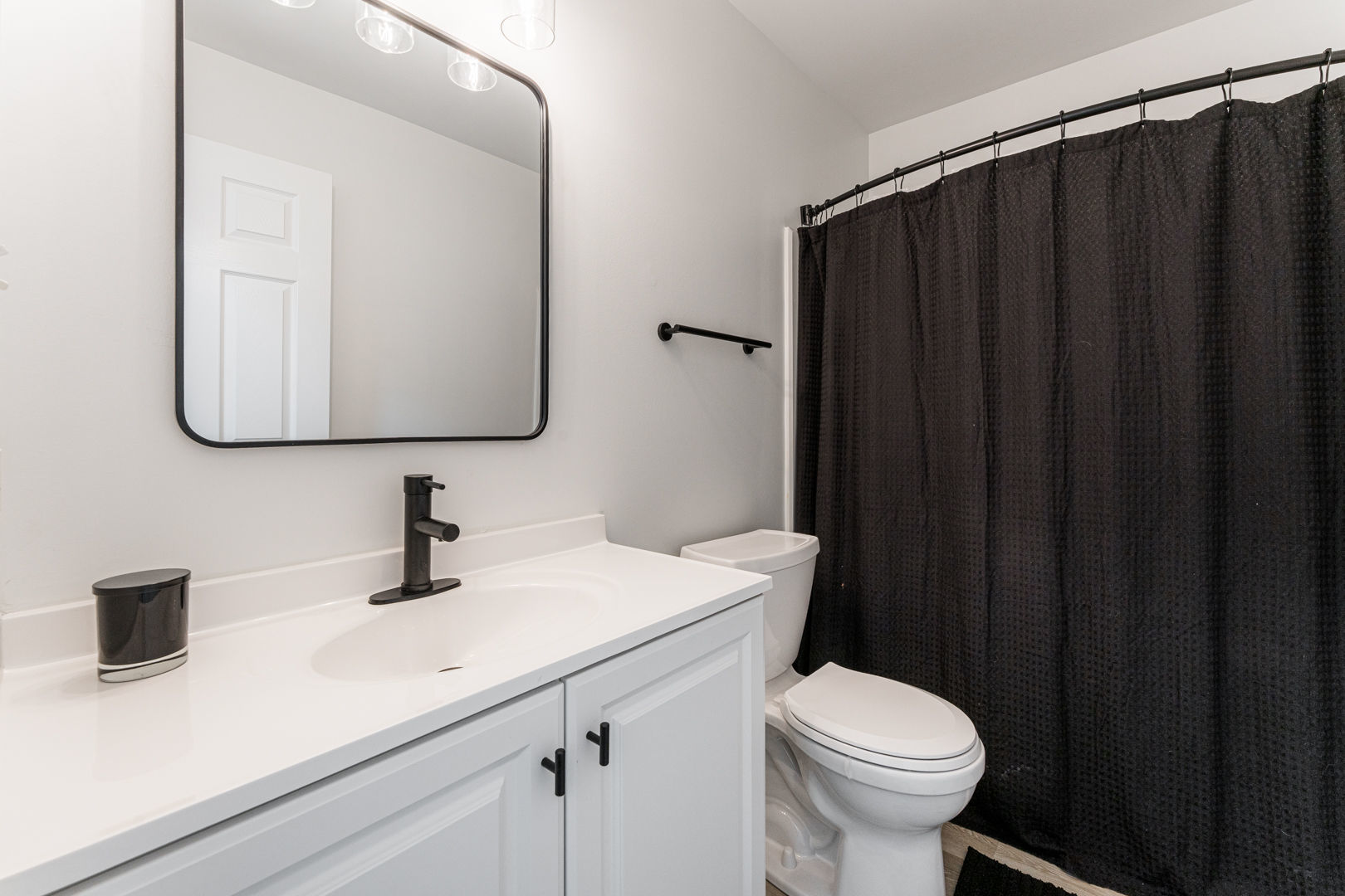 2117 Frantum Road Sycamore, IL 60178 - Photo 17 of 24 a bathroom with a sink and a toilet