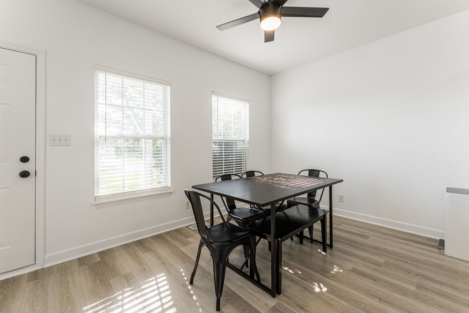 2117 Frantum Road Sycamore, IL 60178 - Photo 4 of 24 a view of a dining room with furniture and wooden floor