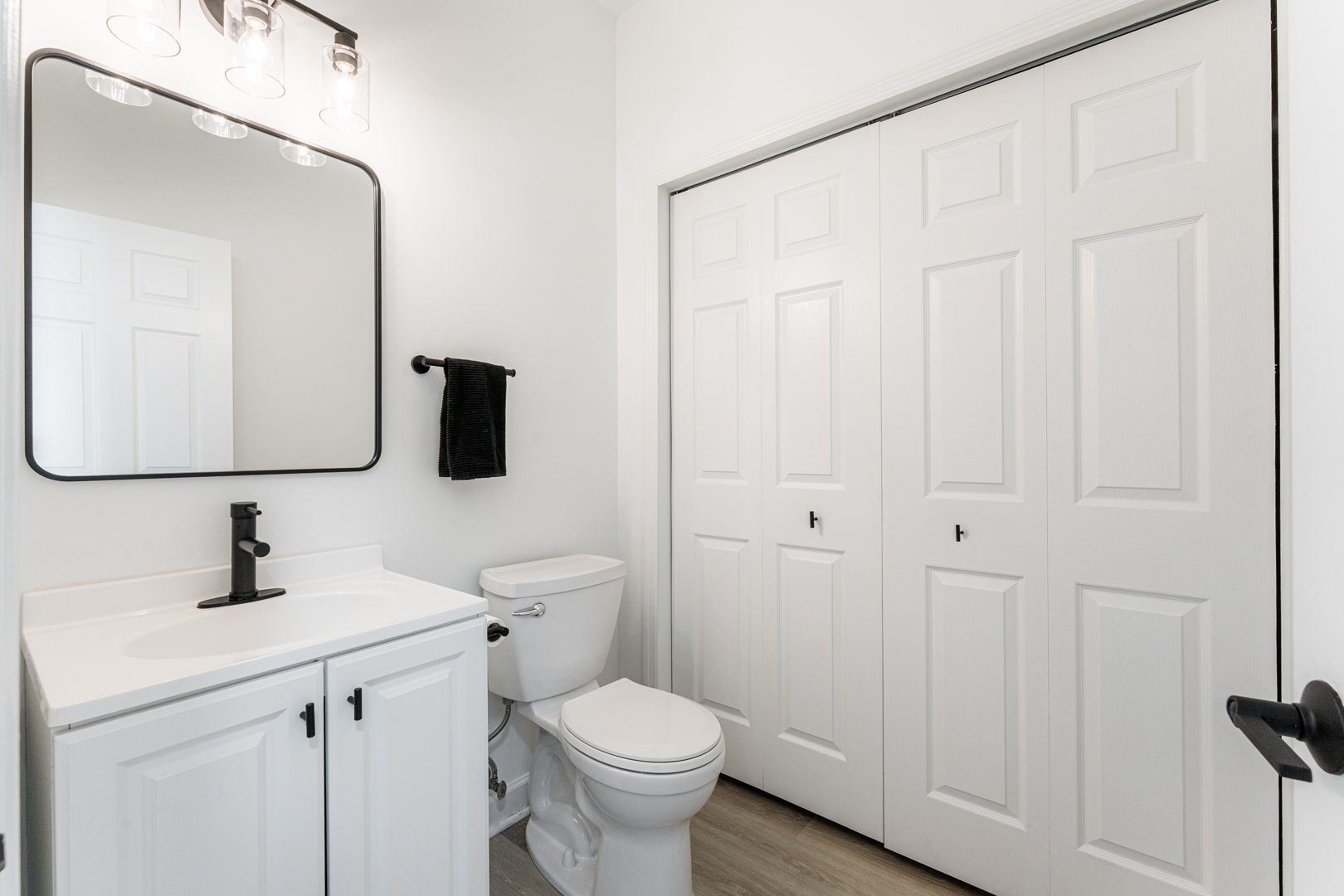 2117 Frantum Road Sycamore, IL 60178 - Photo 9 of 24 a bathroom with a toilet sink and mirror