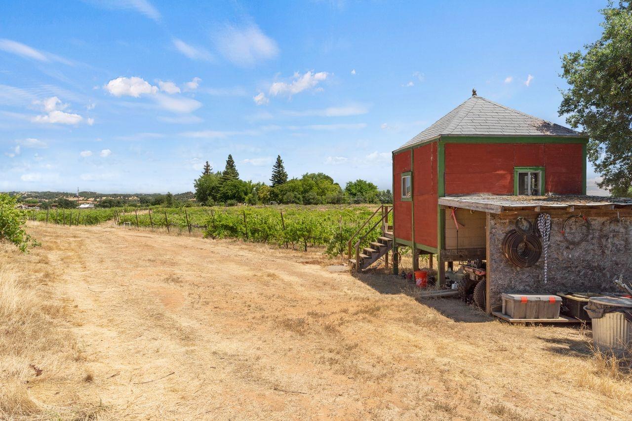 21226 Dickson Road Plymouth, CA 95669 - Photo 14 of 36 a front view of a house with a yard