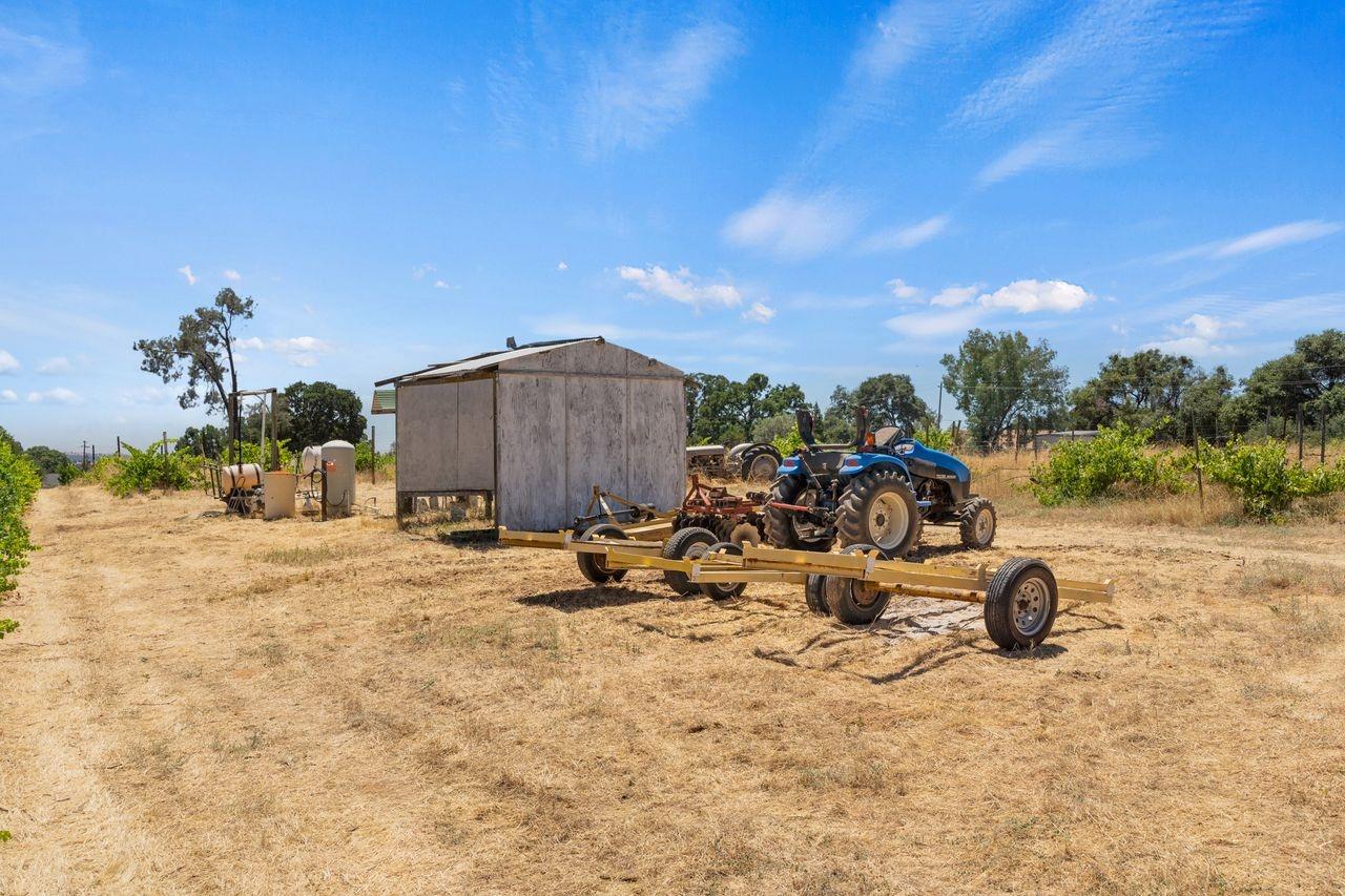 21226 Dickson Road Plymouth, CA 95669 - Photo 20 of 36 a view of a backyard with sitting area