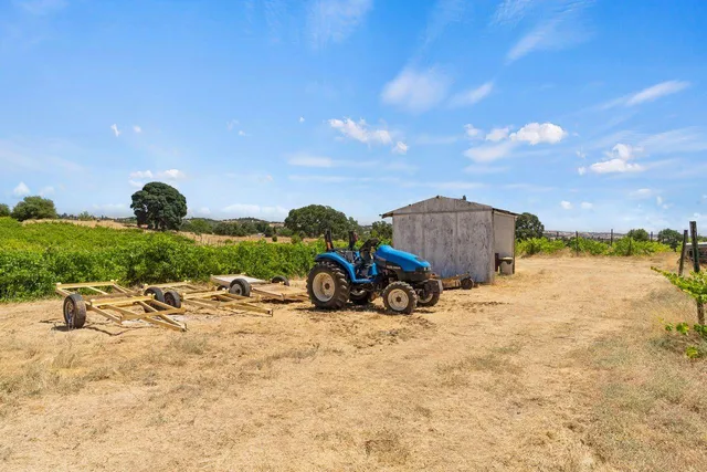 a view of a balcony with floor to ceiling windows with wooden floor