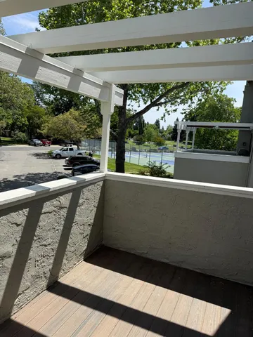 a utility room with cabinets washer and dryer