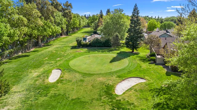 a view of a playground with basketball court