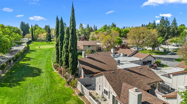 a view of a golf course with a big yard
