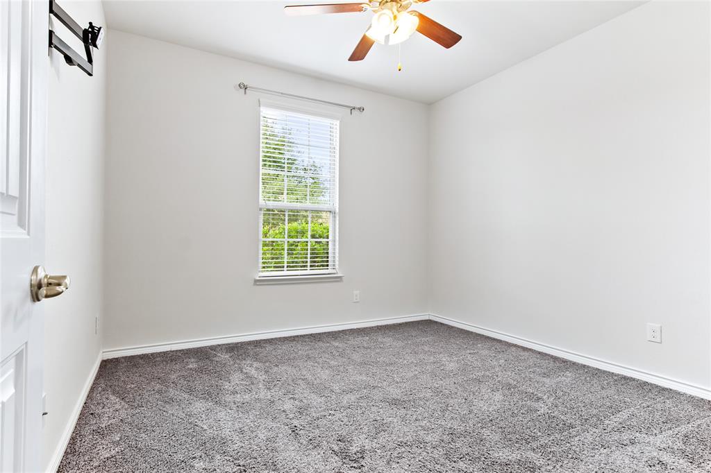 3100 Rademaker Drive Heath, TX 75126 - Photo 20 of 26 an empty room with a window