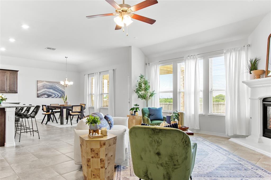 3100 Rademaker Drive Heath, TX 75126 - Photo 2 of 26 a living room with furniture and a large window