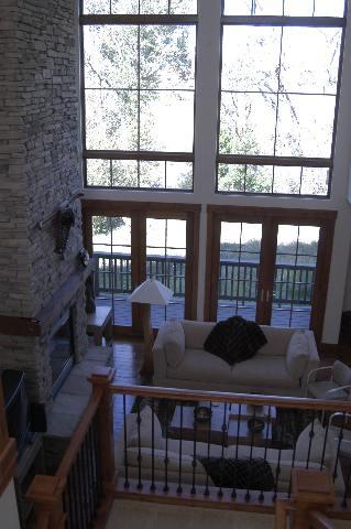 1256 Crystal Bluff Loop Carbondale, CO 81623 - Photo 1 of 7 a living room with furniture and a floor to ceiling window