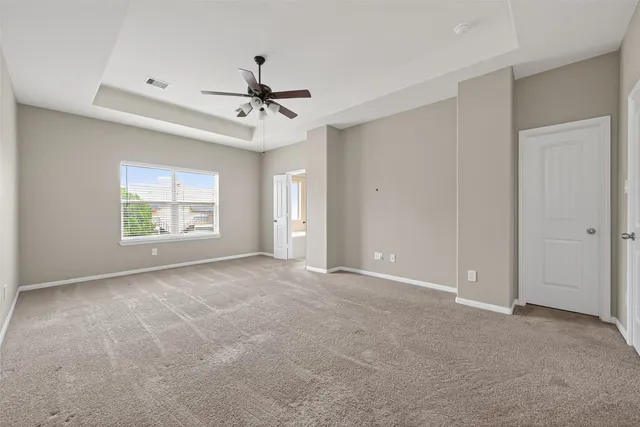 a view of a ceiling fan in a room