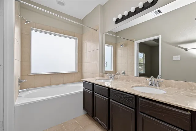 a view of a backyard with sitting area