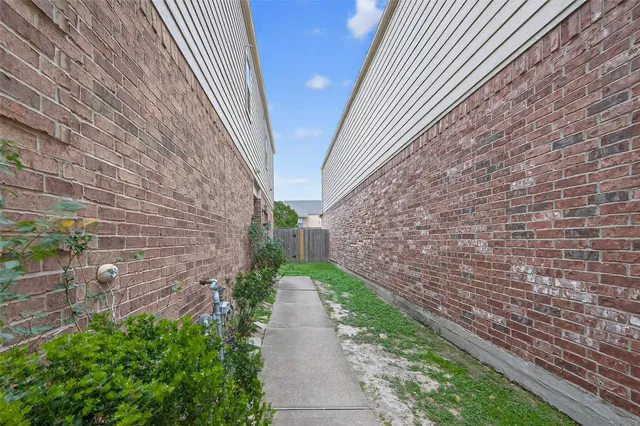 a view of a pathway with a house