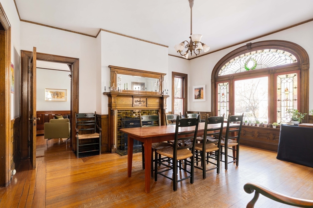 61 Centre Street Brookline, MA 02446 - Photo 12 of 31 a view of a dining room with furniture window and wooden floor