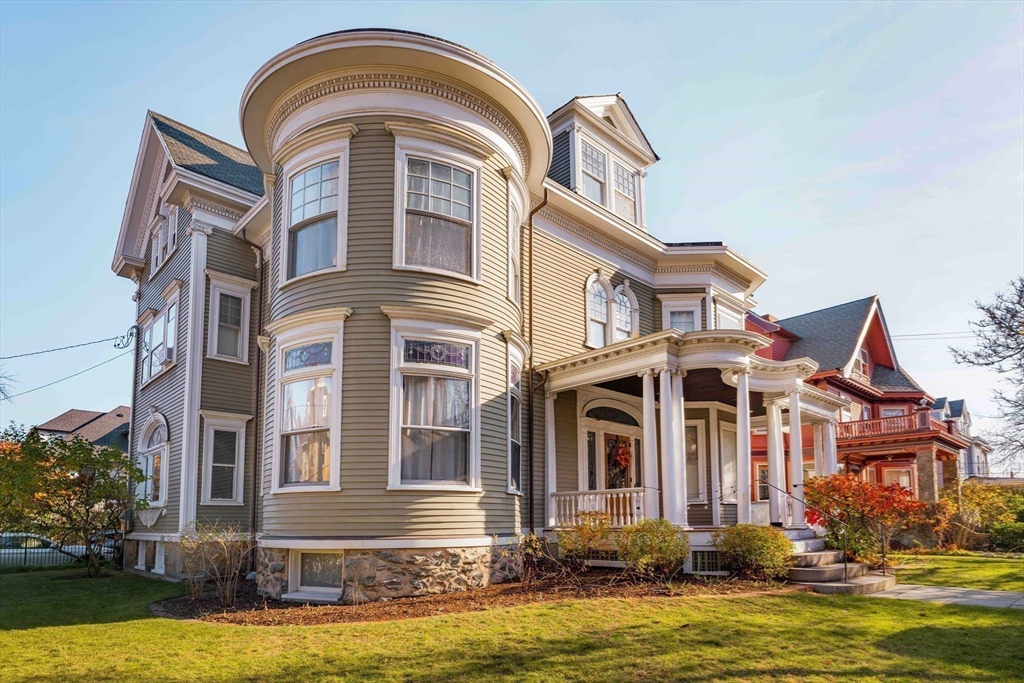 61 Centre Street Brookline, MA 02446 - Photo 31 of 31 a front view of a house with a large pool