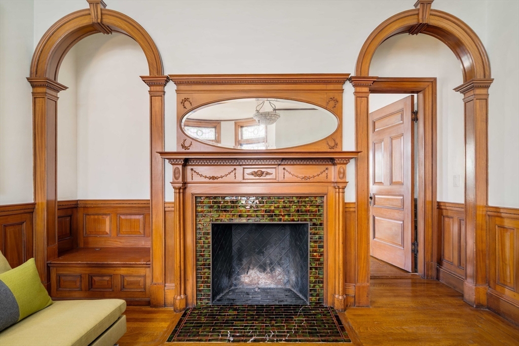 61 Centre Street Brookline, MA 02446 - Photo 6 of 31 a view of fireplace with a wooden floor