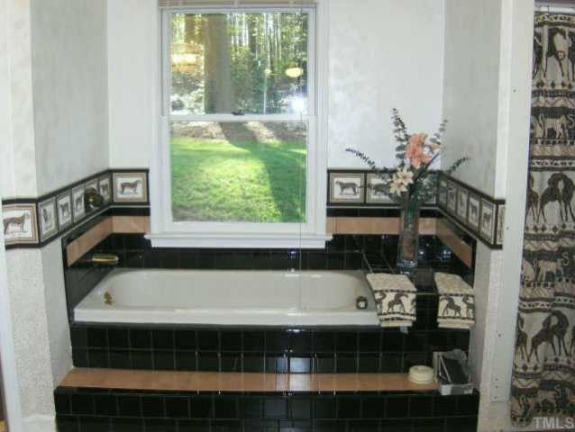 120 Singleton Street Raleigh, NC 27606 - Photo 11 of 12 Master Bathroom Features Tub and Seperate Shower Other
